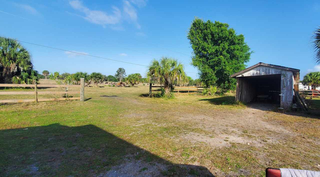 The pastureland.