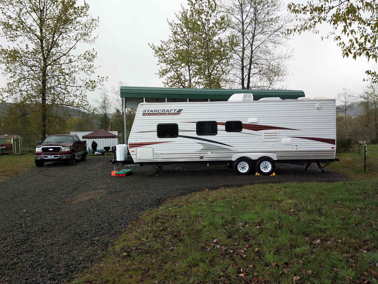 29' trailer backed in next to owners trailer 