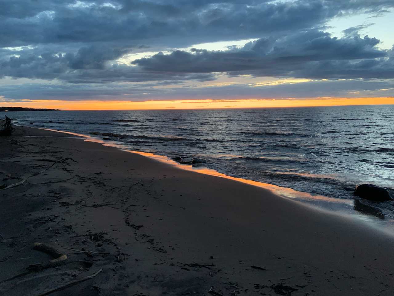 Sitting on the beach and the Sunset still going at 10pm!