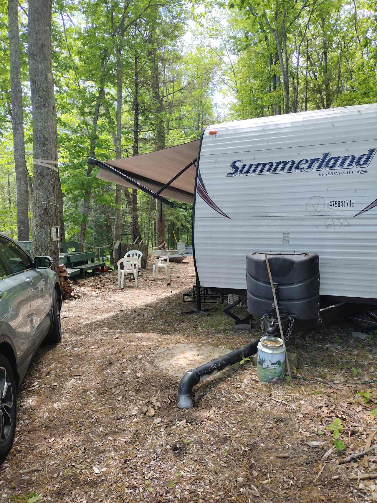 RV situated overlooking the brook taken from parking area