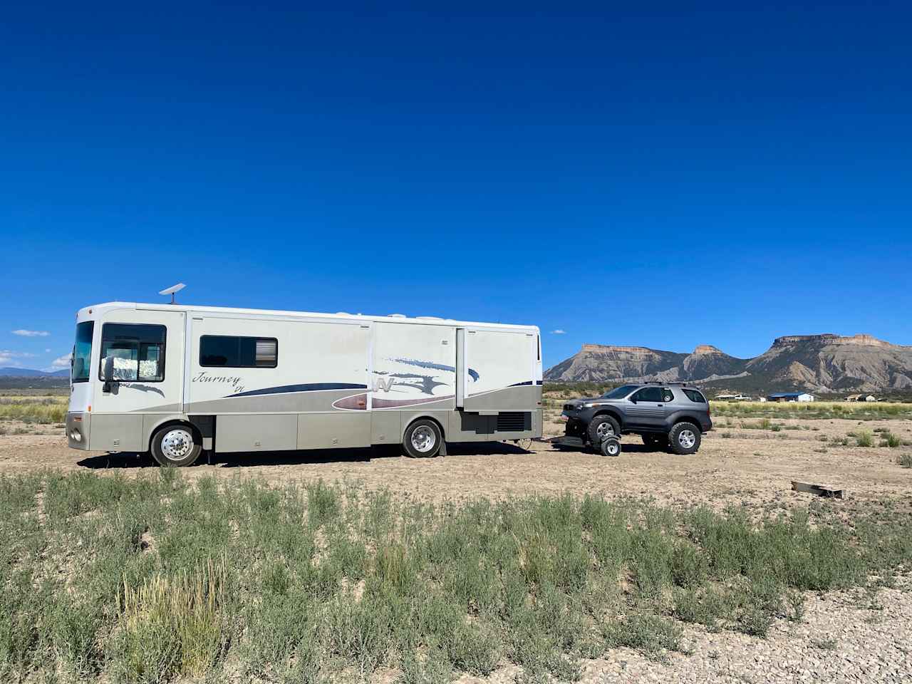 THE VIEWS Campsites: You can setup a tent or park your RV at this dry site.   Pictured is a 32' RV and the max we now allow is 28'.  How you can position the rig depends on the season.  
- Showers, Kitchen, etc.. are a short walk.