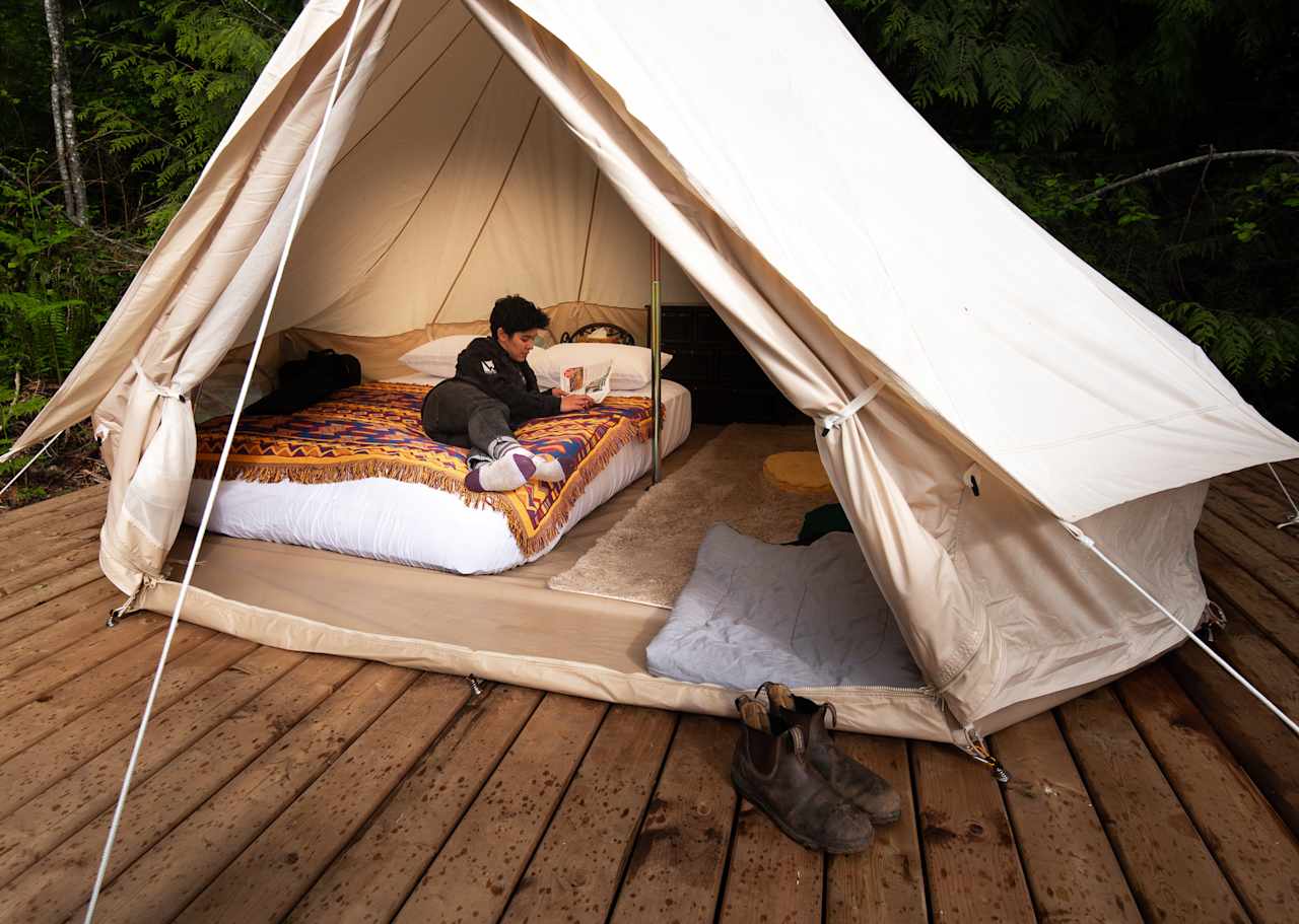 Inside the tent is a large air mattress with a foam topper - so comfy!