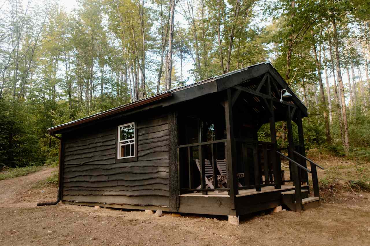 The cabin looking from the picnic tables 