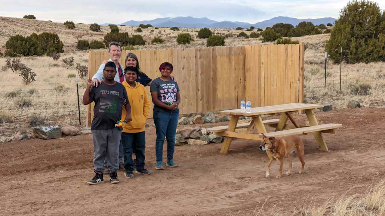 Happy family, happy doggo.