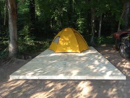 10 x 16 sturdy platform with tent tie down points along the edge of platform. 2 person tent is available for rent.