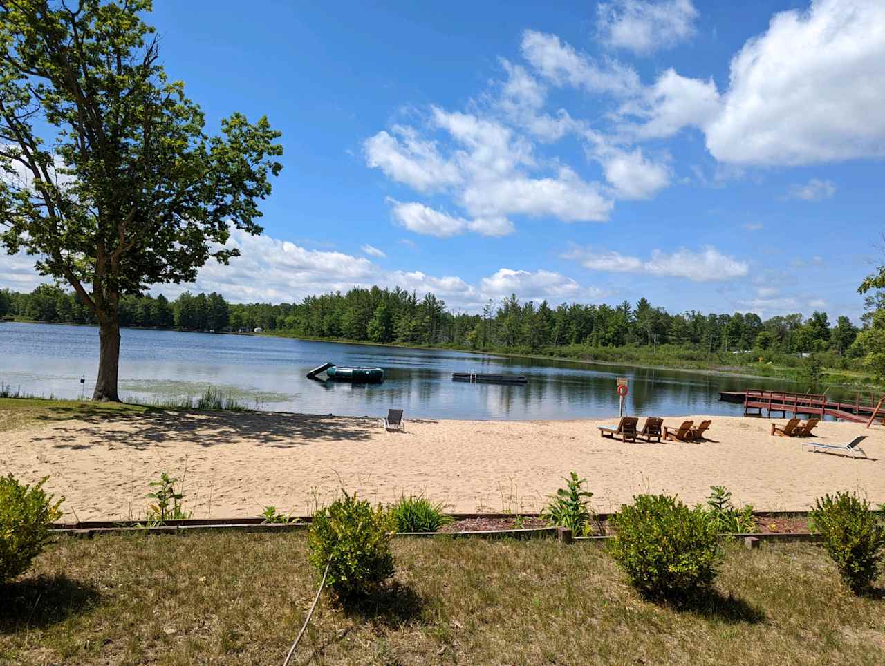 Beautiful sandy beach with a swimming floats