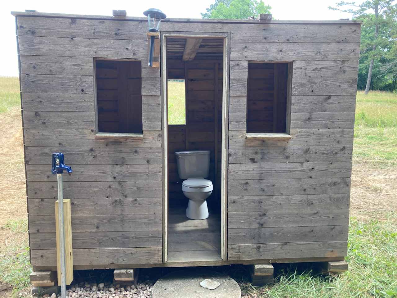 New Bathroom with working toilet and water spigot!
