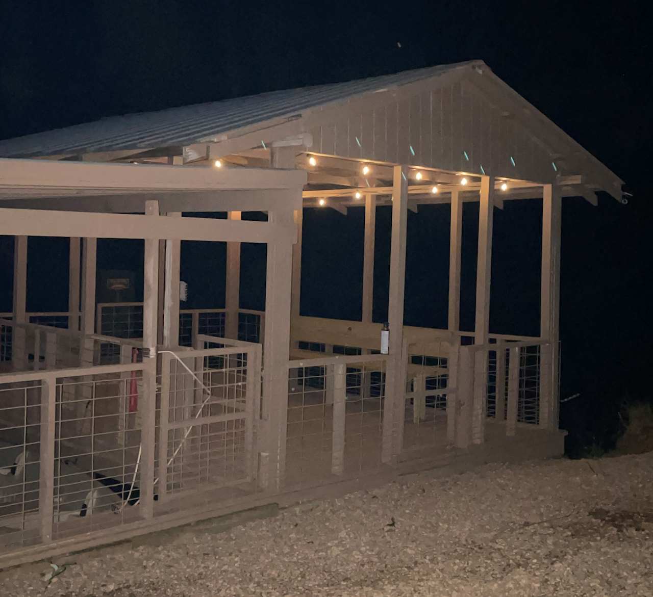 Lighted fishing boat dock at night