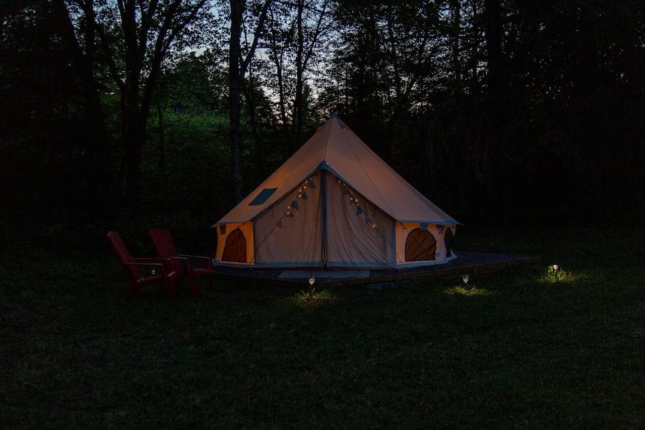 The Bell Tent all lit up at night