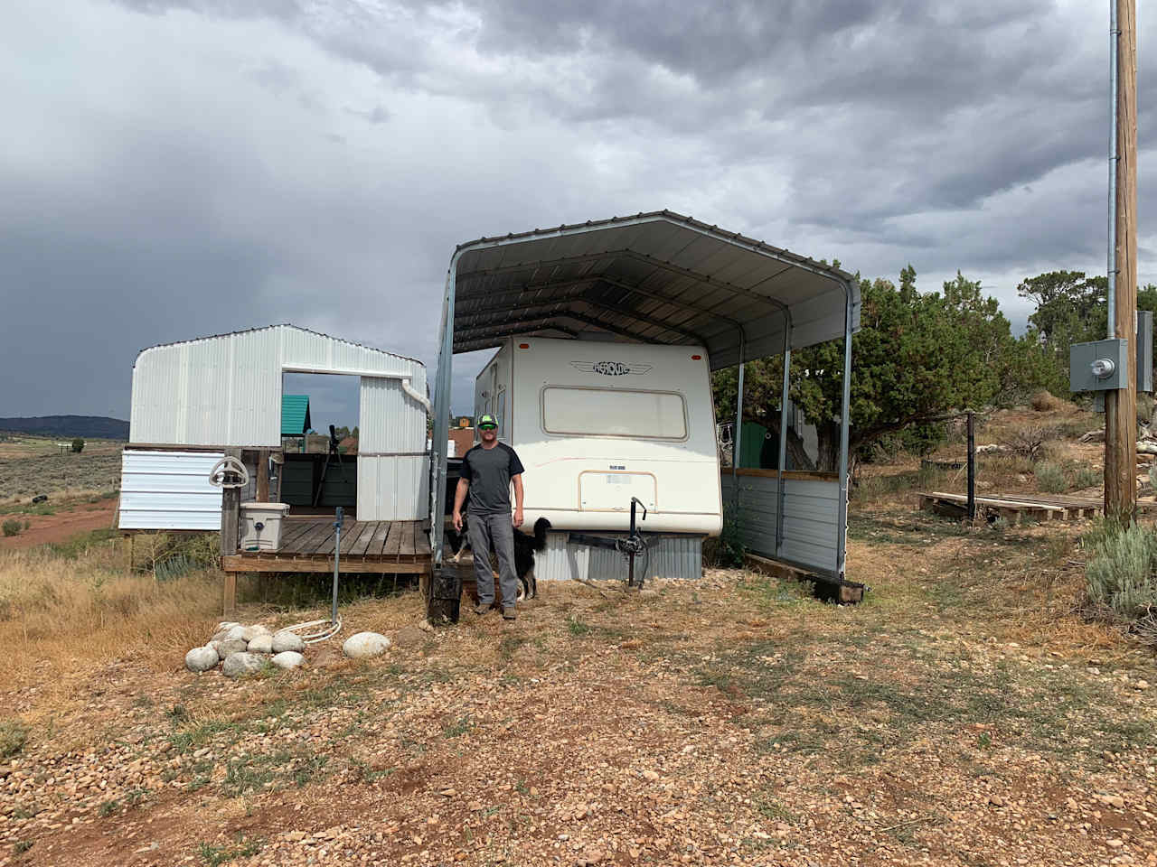 This is RV slot # 1 has a camper in it as an example of the covers. However this RV slot has the covered patio and fridge!