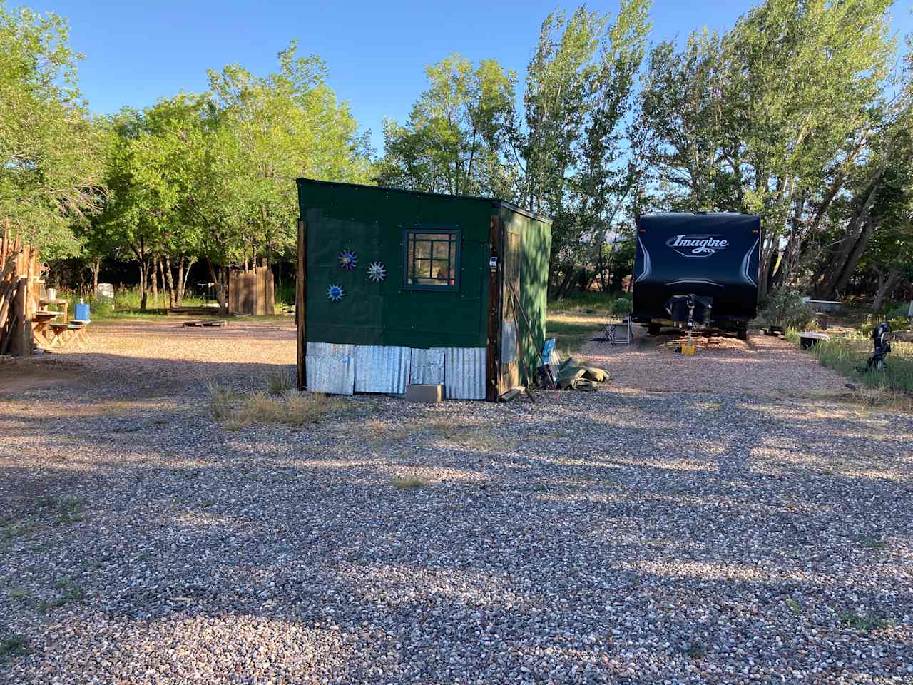 Looking West.. Site A on the left and potential site B..  She shed in the center. Shed is for extra trailer needs.