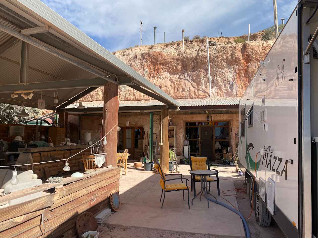 Karen’s residence and a Bnb cut into the cliff face. Guest pavilion at front. 