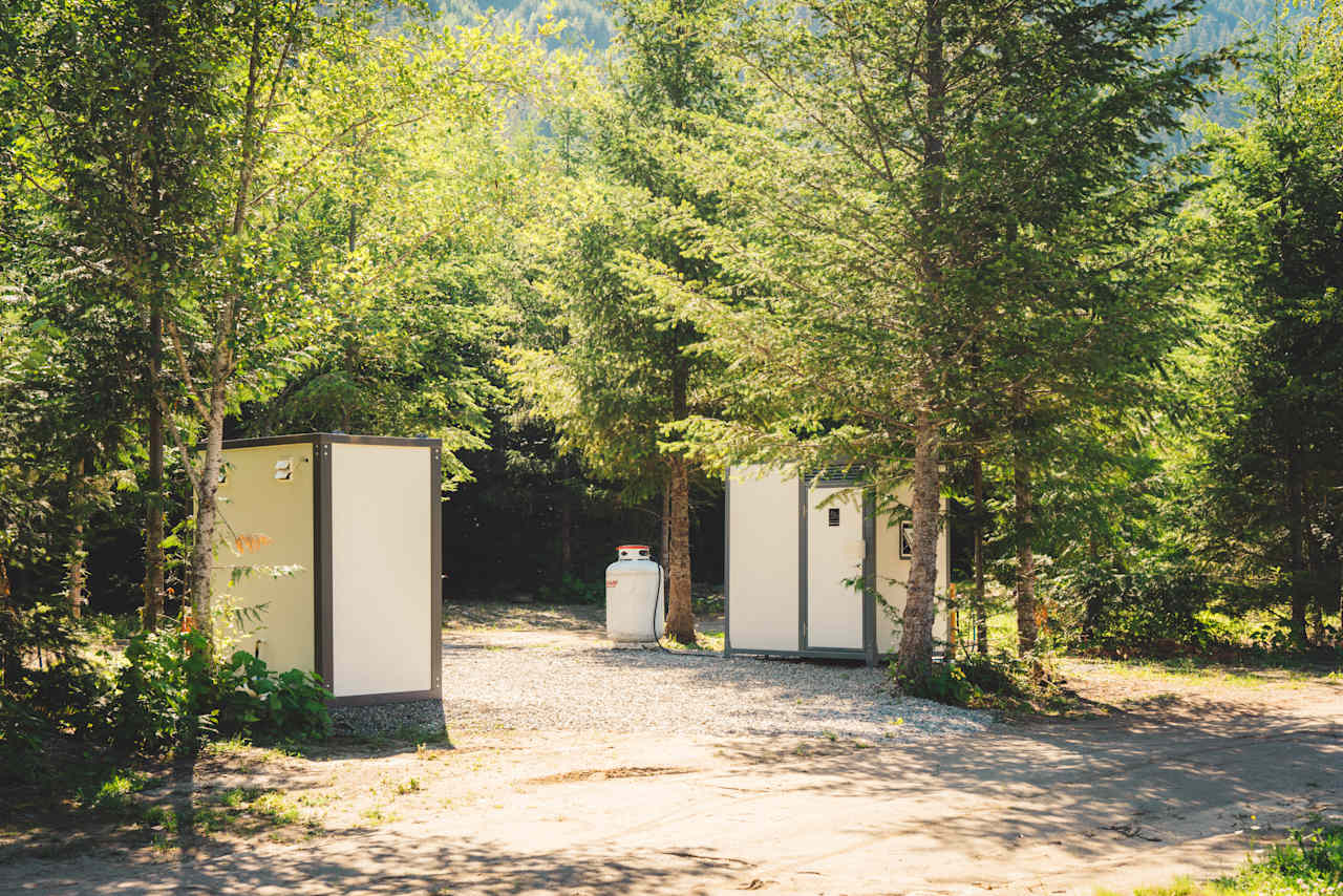 The flushable outhouses and shower. 