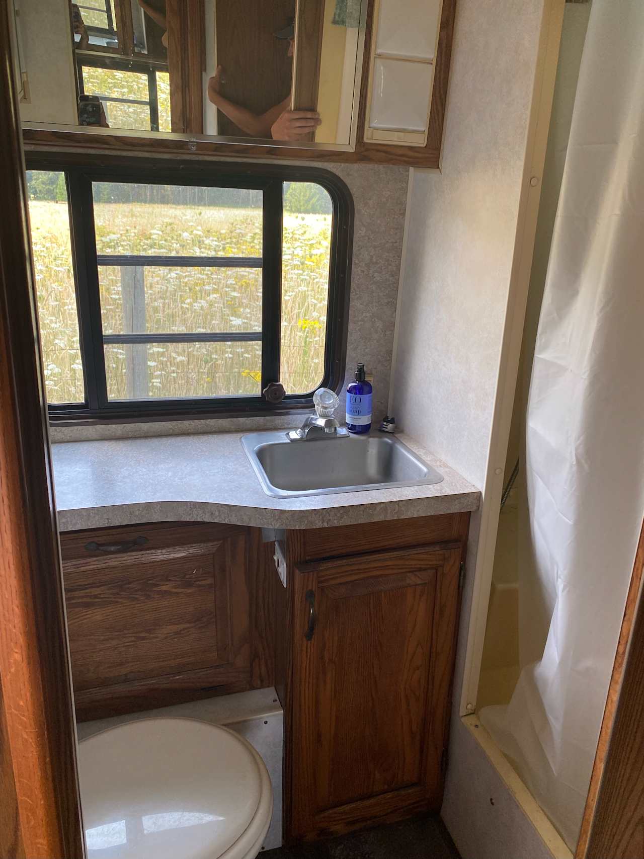 Bathroom has shower and toilet