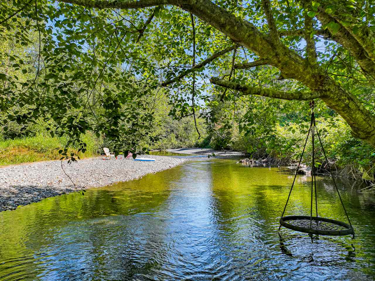 Riverside seating when accessible and over the river meditation swing!