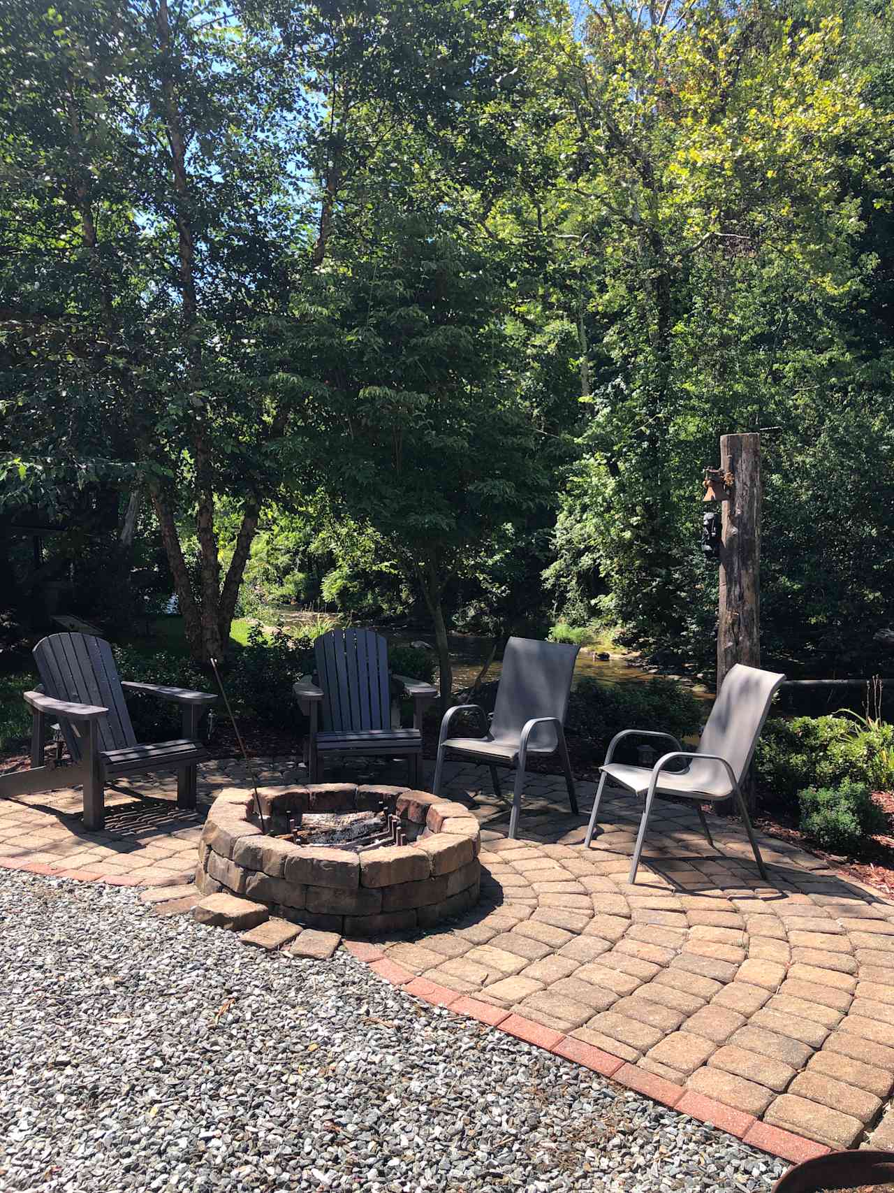 Fire pit with River in backyard