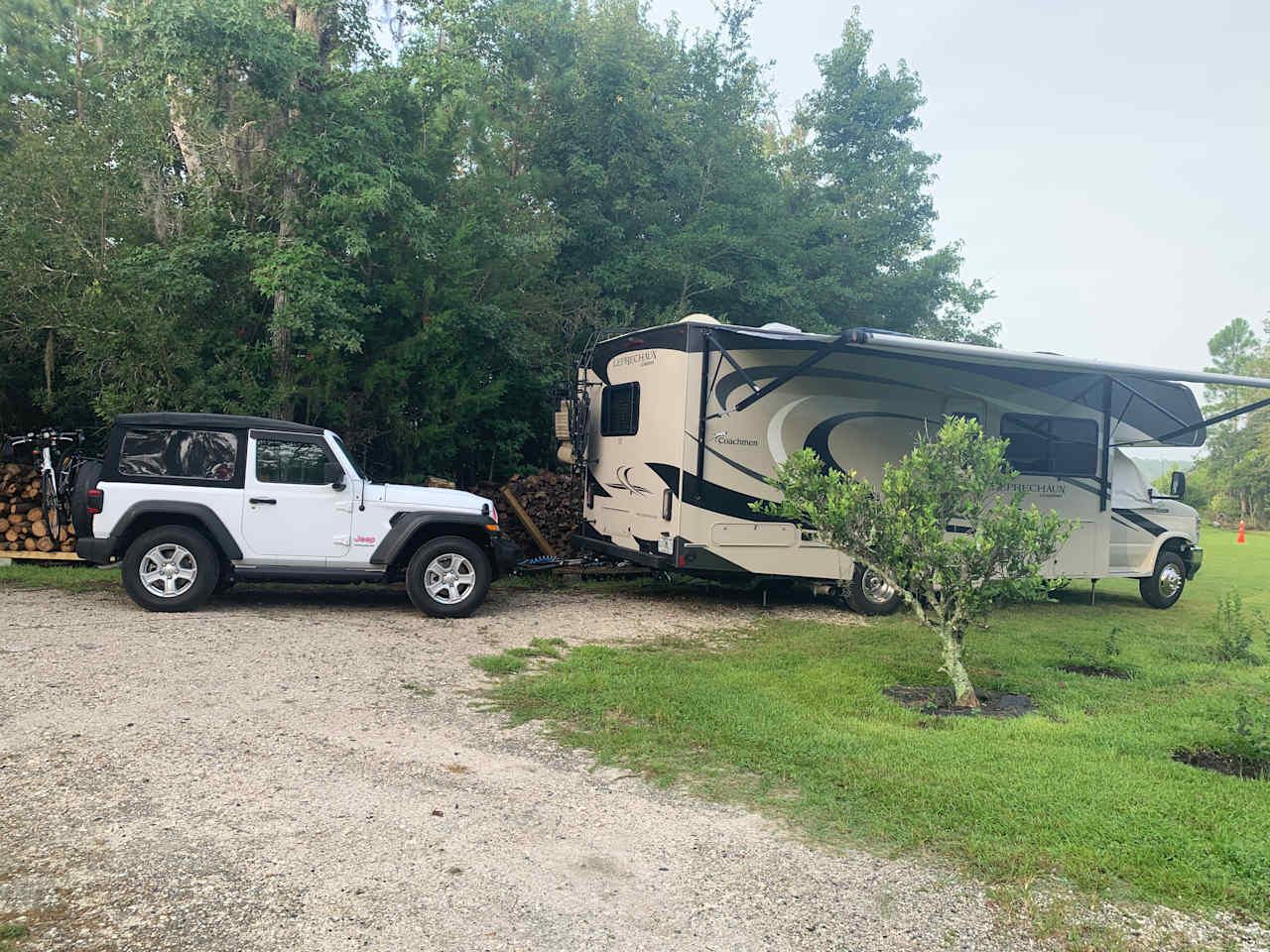 The campsite with water and electric hook ups and a circular driveway!