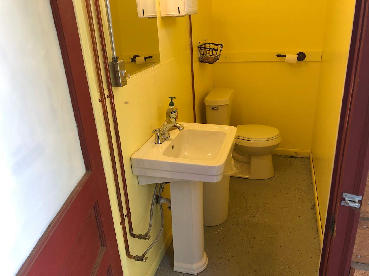 Sink and toilet area at restrooms