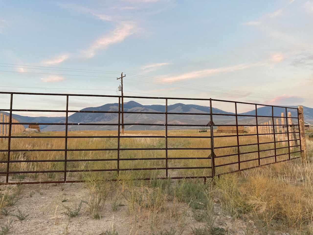 Open these gates to enter fully fenced, gated property