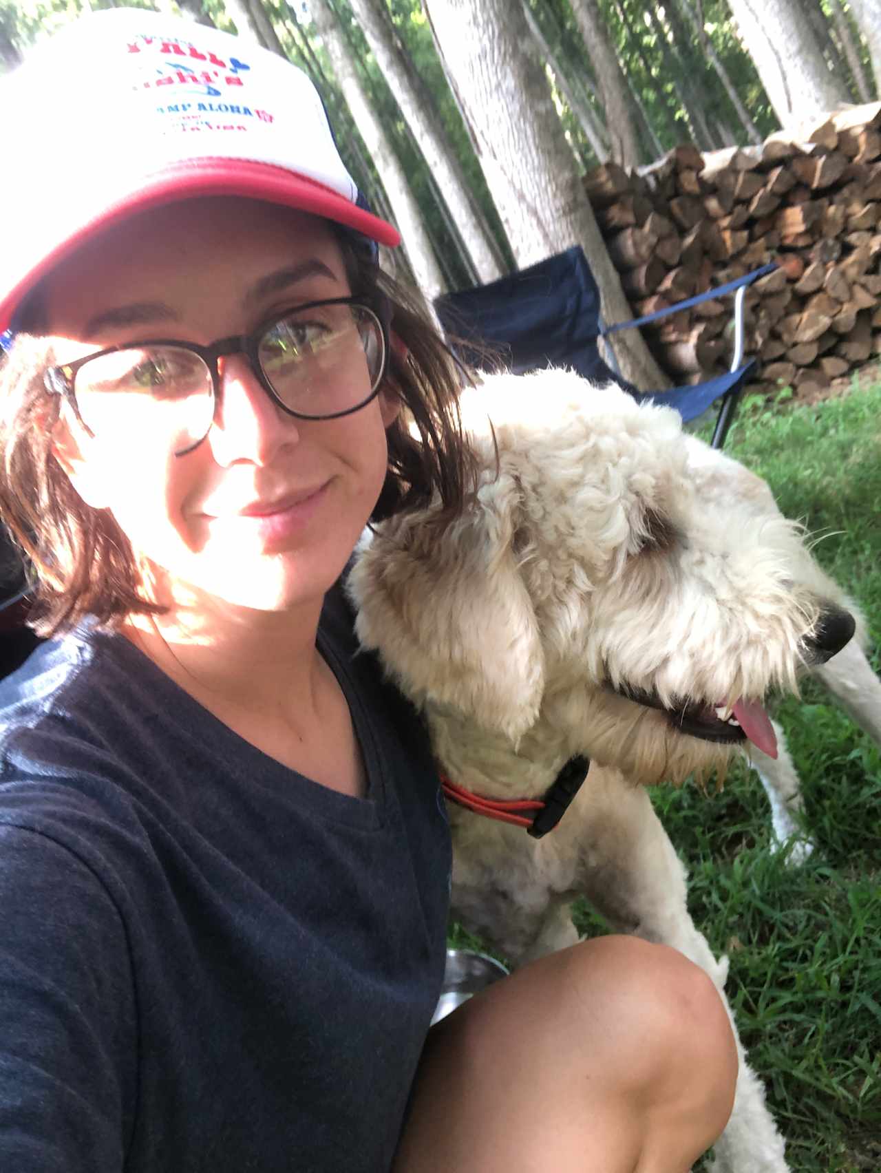 Dog and I before setting up the site, you can see the firewood in the background