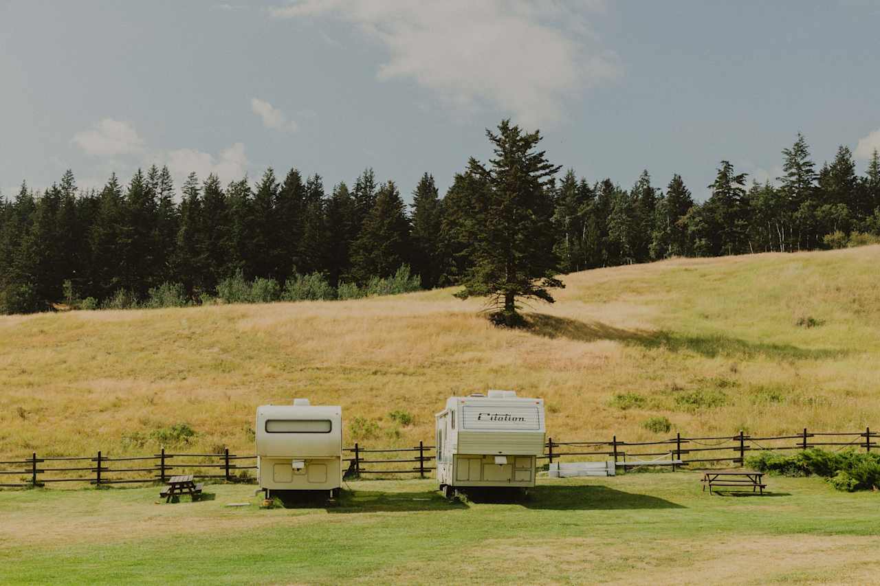 The two RVs also available for rent on the site.