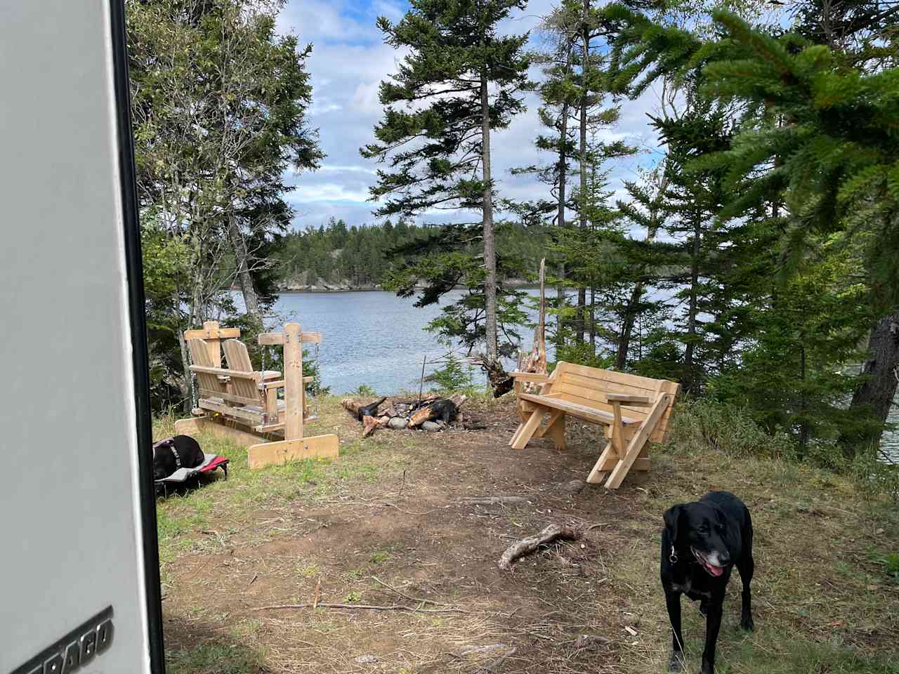 Swinging bench and picnic table with a view!