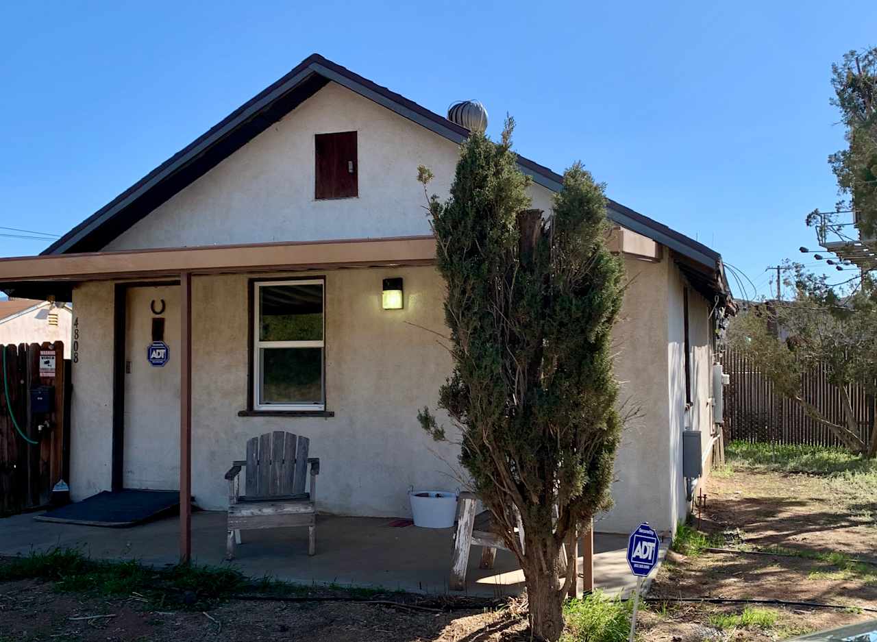 Additional long-term parking available behind our house and next to our shop with a 30AMP outdoor plug. Hose needed to reach faucet of well water.