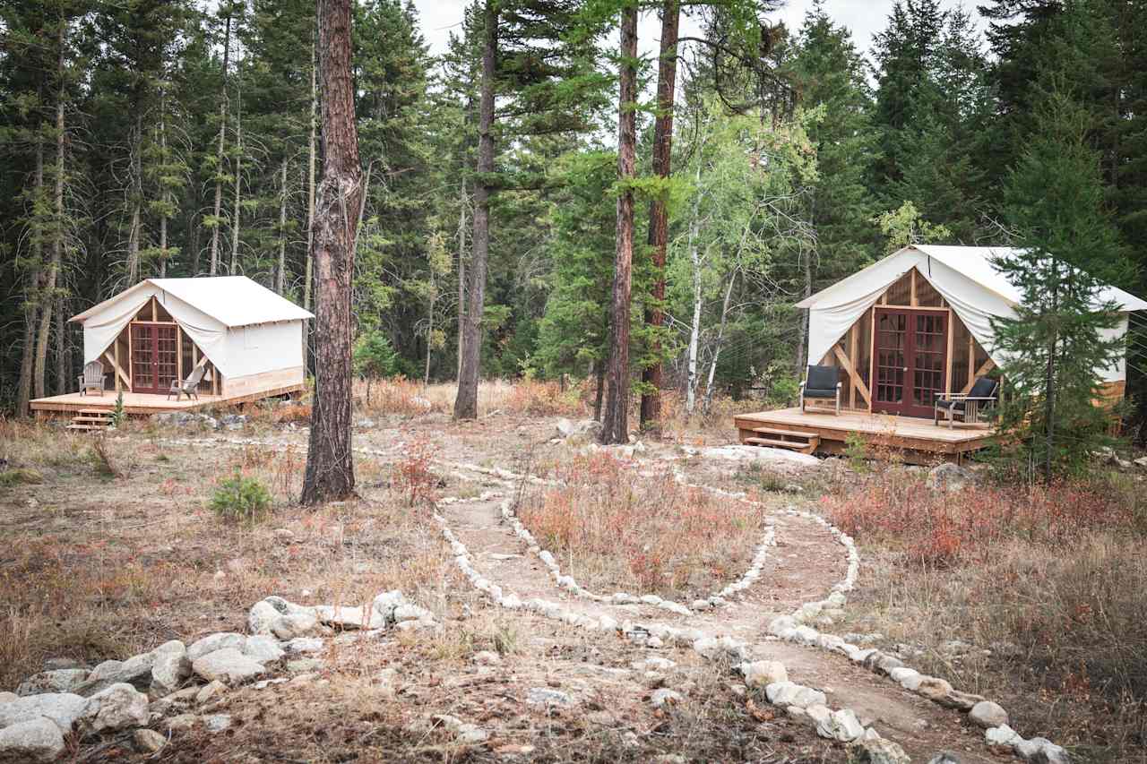 Queen tent on the left Bunk tent on the right. Approx. 100 ft between via path. 