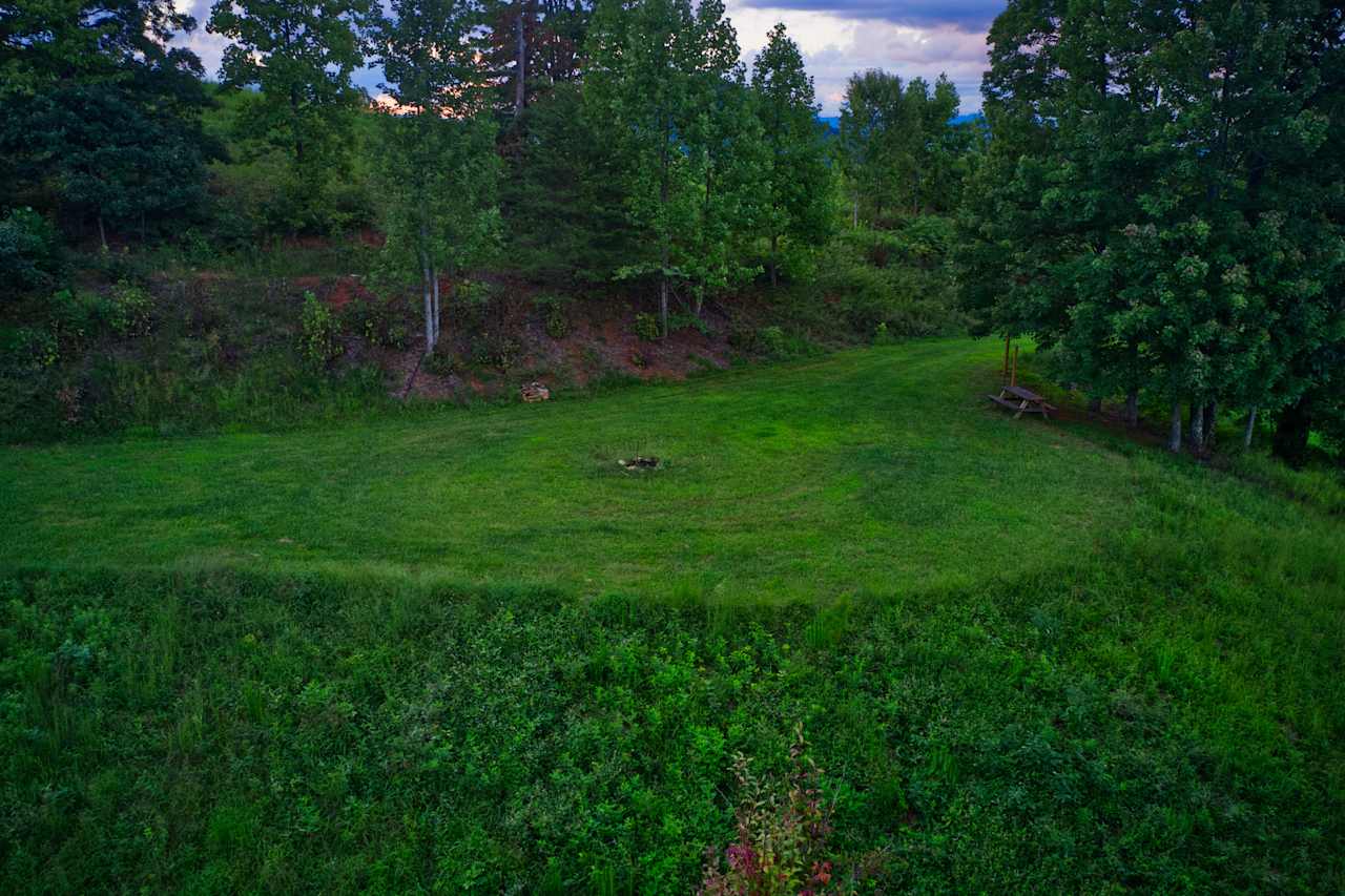 Campsite B, large mowed circle around fire pit.