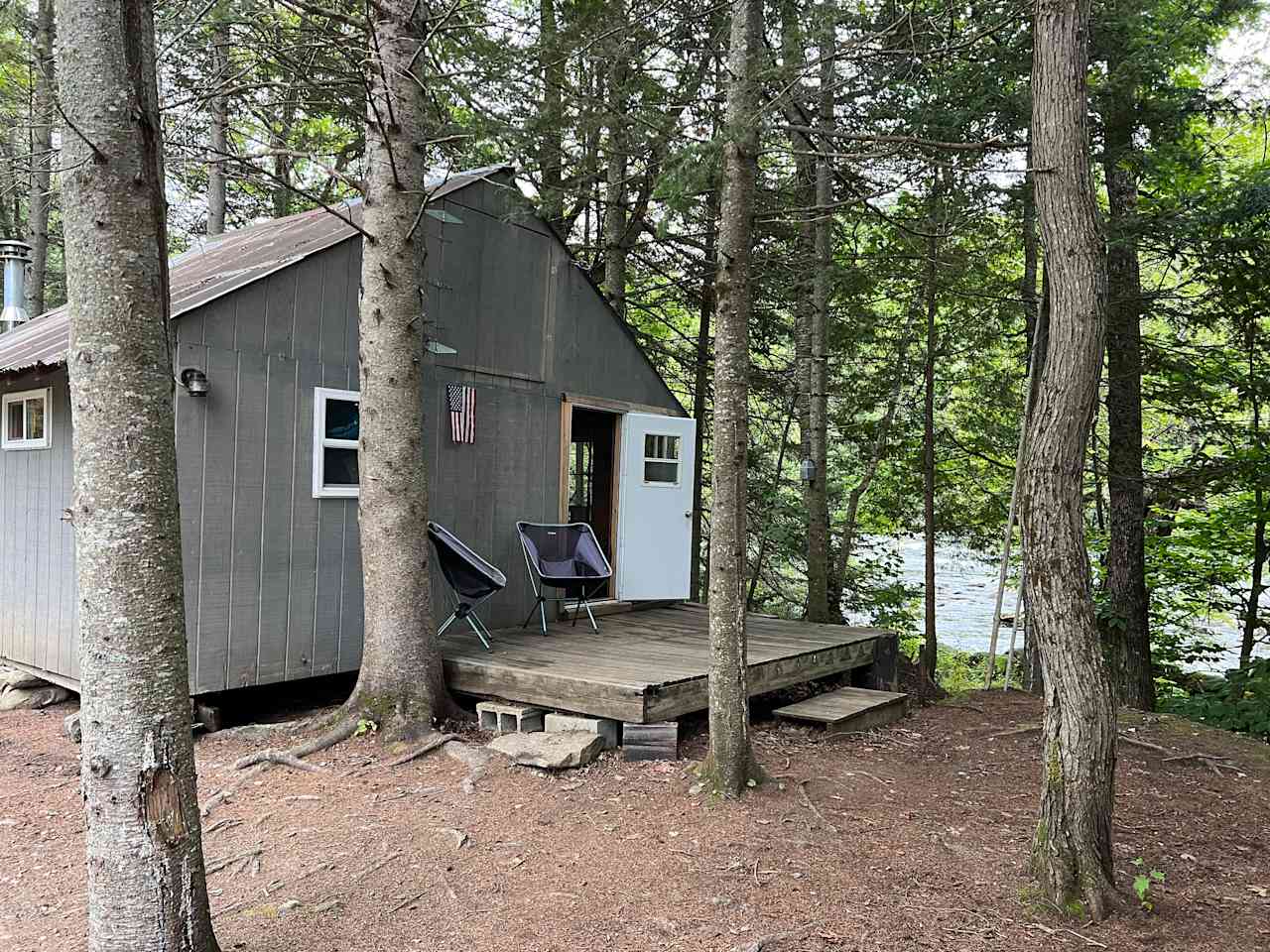 Grey Cabin next to Androscoggin River.