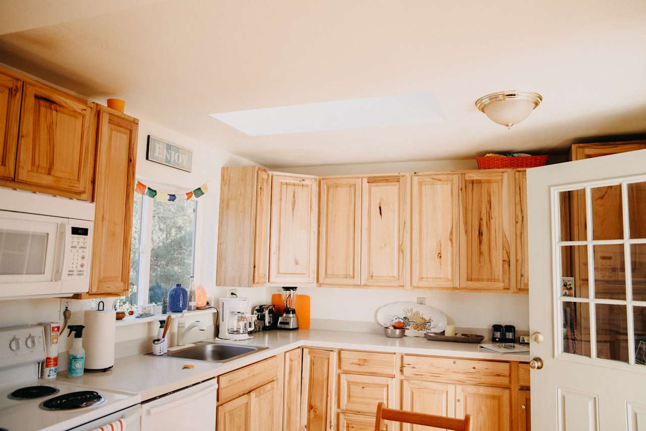 Full kitchen, with fridge, stove and pots and pans! 