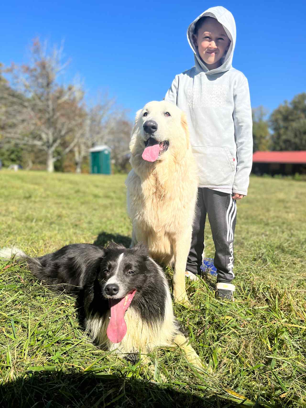 Draco, the host dog with my youngest son and Titan 