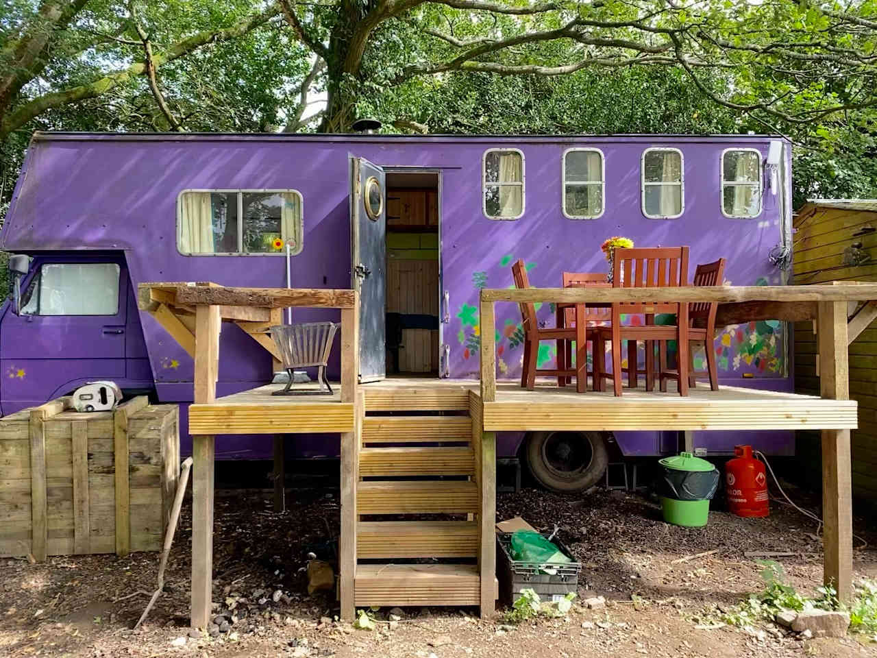 Horsebox terrace nestled in our oak copse with far reaching views of Wye Valley.