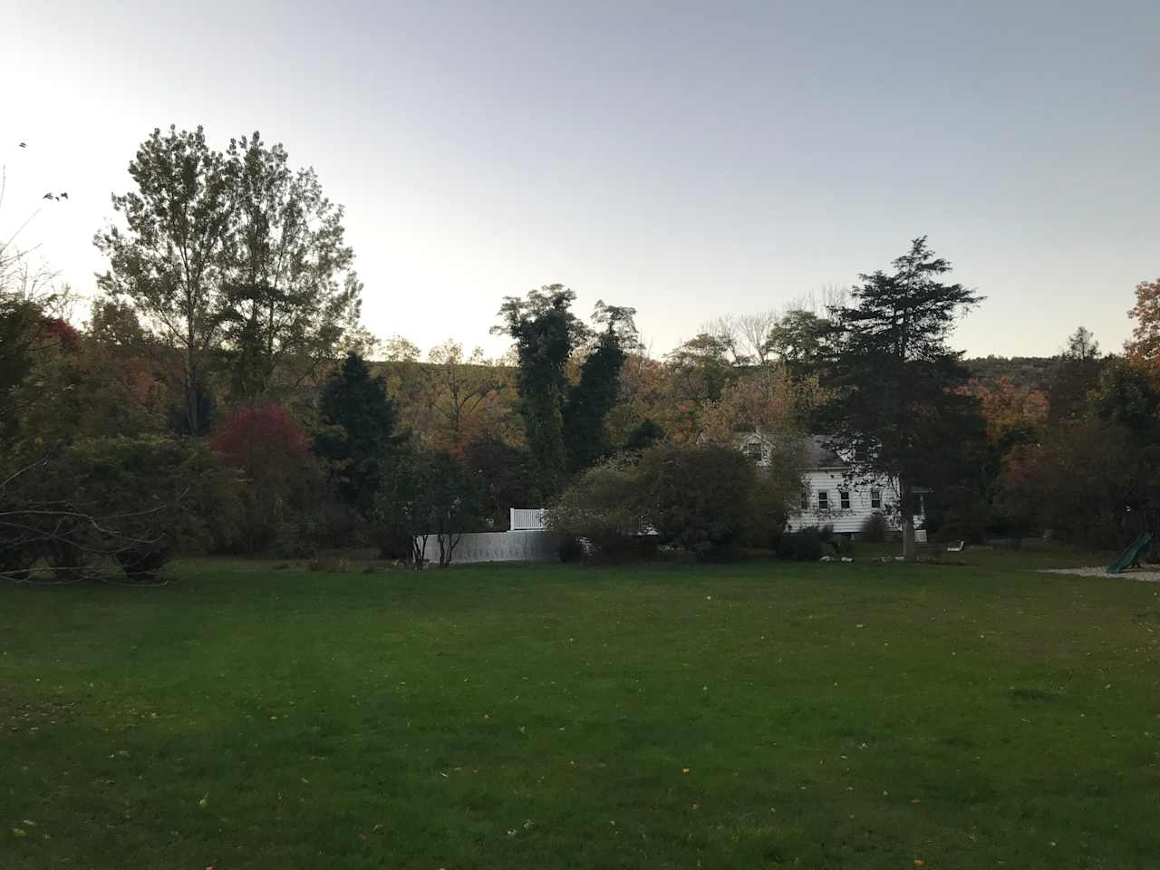 View of field from barn to house