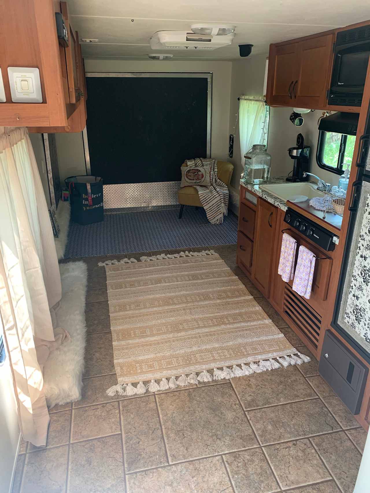 Grey Wolf Camper looking to left at doorway 