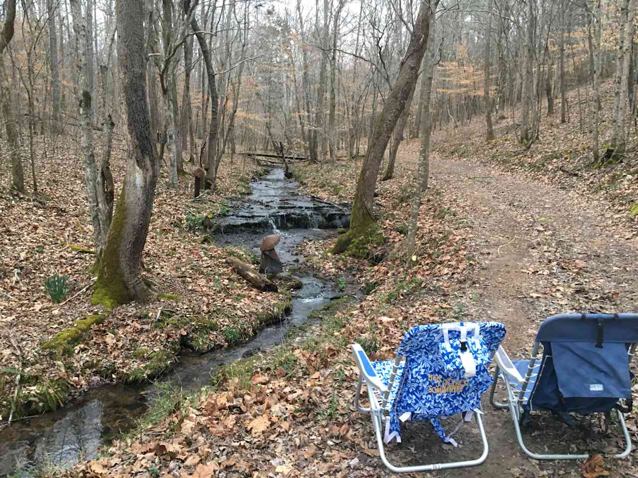 Hiking trail/road in the 2nd valley.  Site 3 (Still Hollow) is beyond the bridge.   There are several spots to choose from to set up.

