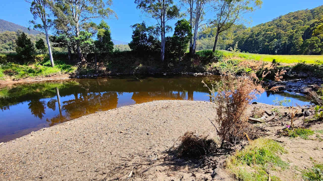 Riverbend swimming beside campsite's