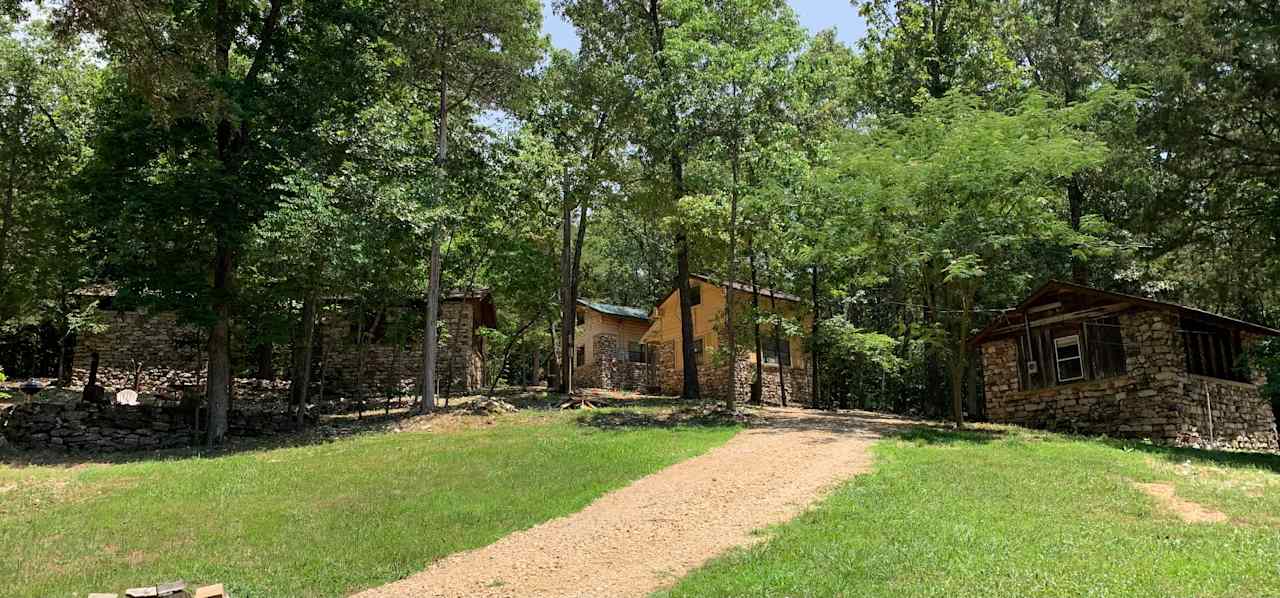 This wooded hillside is home to four stone cabins that were built in the 1940s for Camp Miramichee. Three of these are available here on Hipcamp.