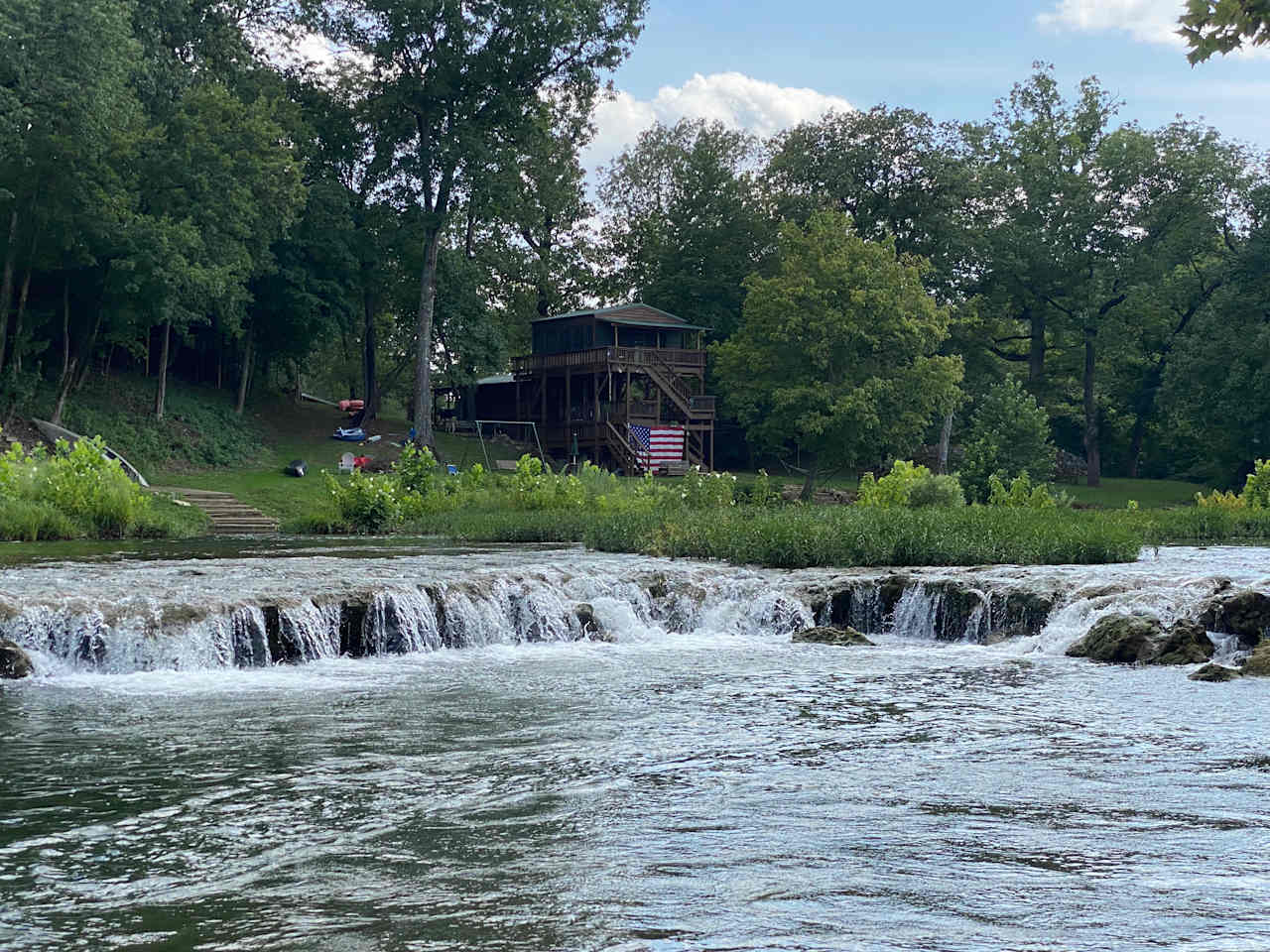 This is Miramichee Falls. The River Cabin is in the background.