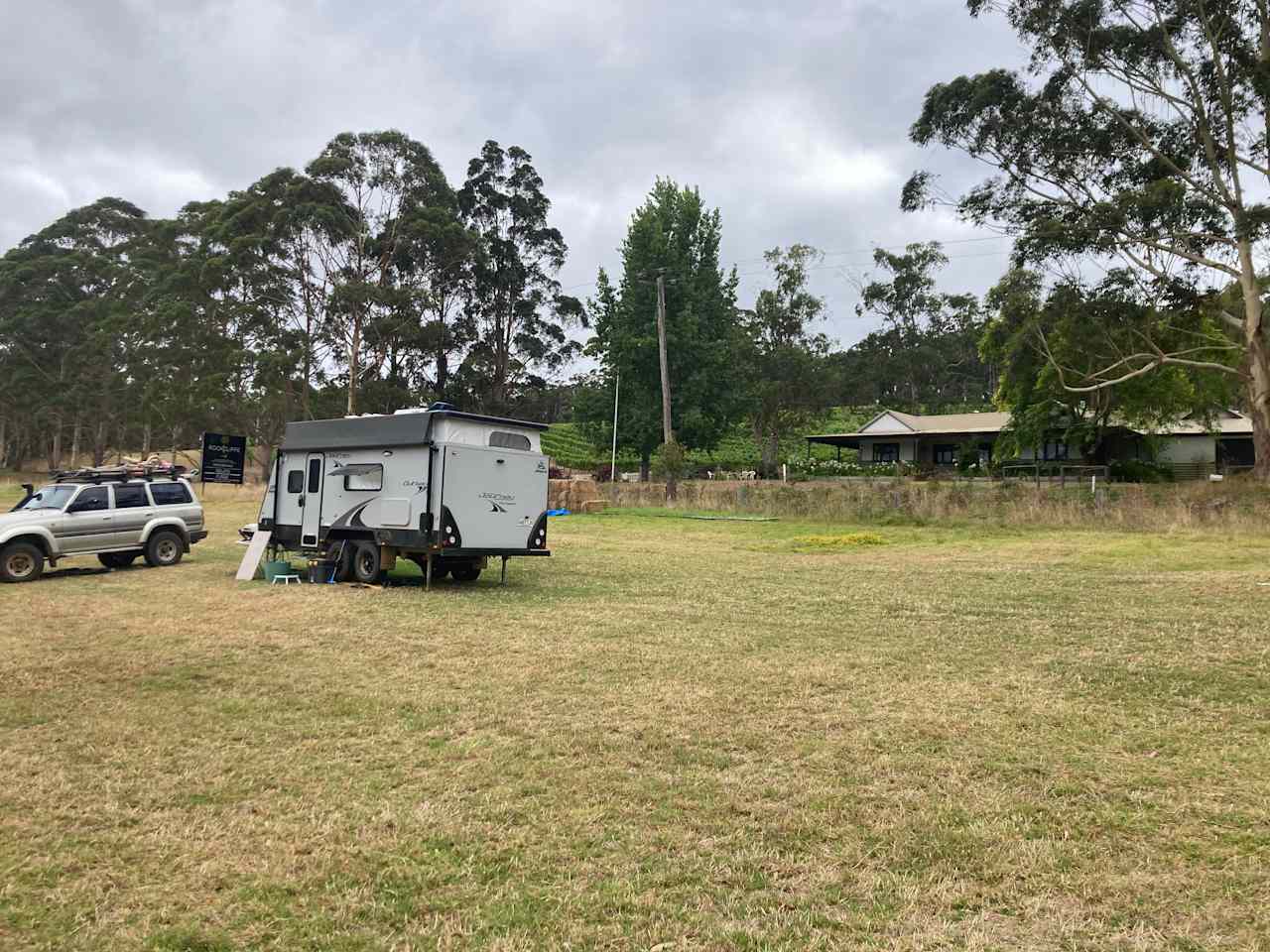 The camping field with winery behind. 