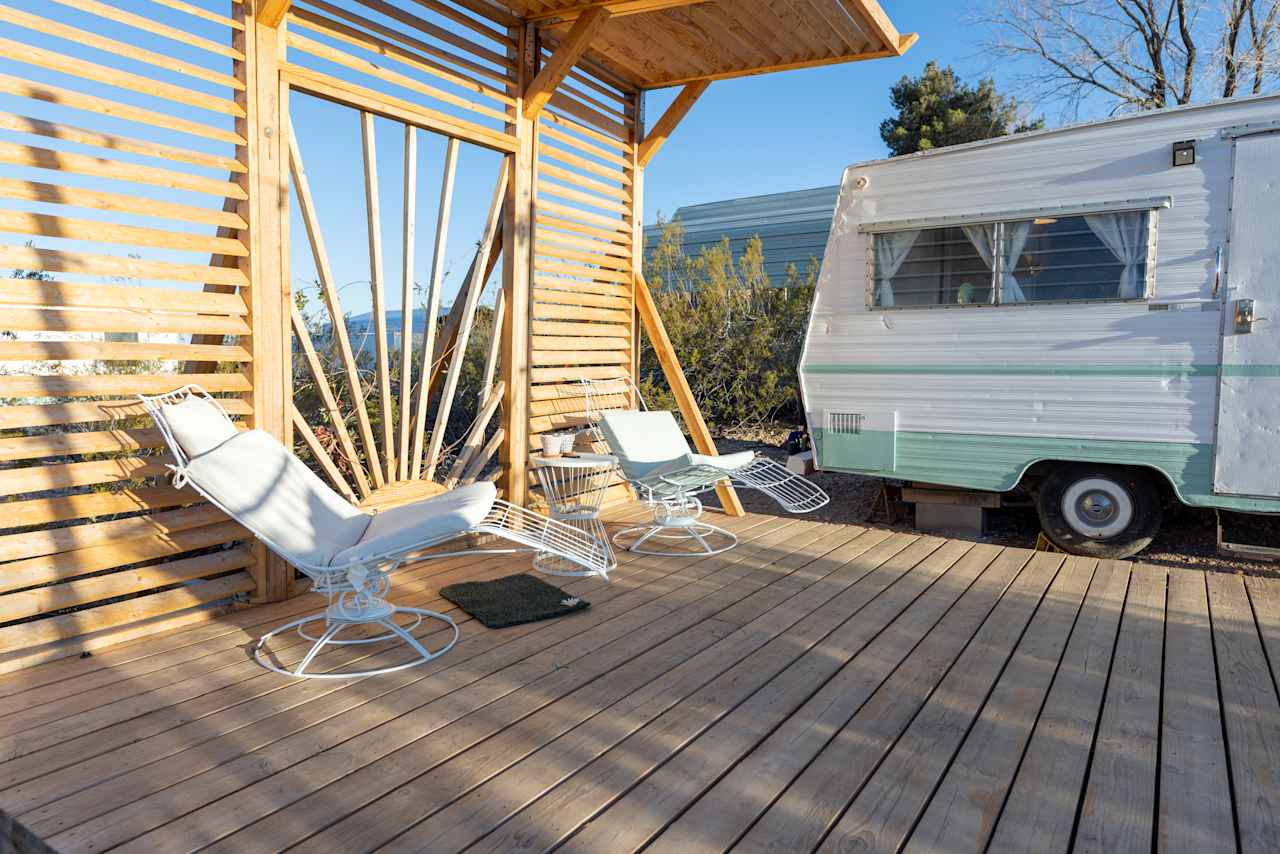 Retro Camper with Mountain Views