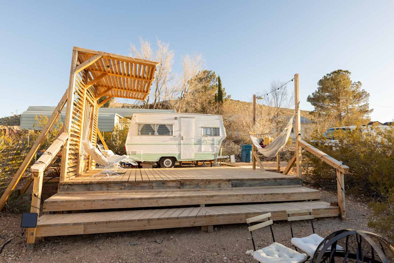 Retro Camper with Mountain Views