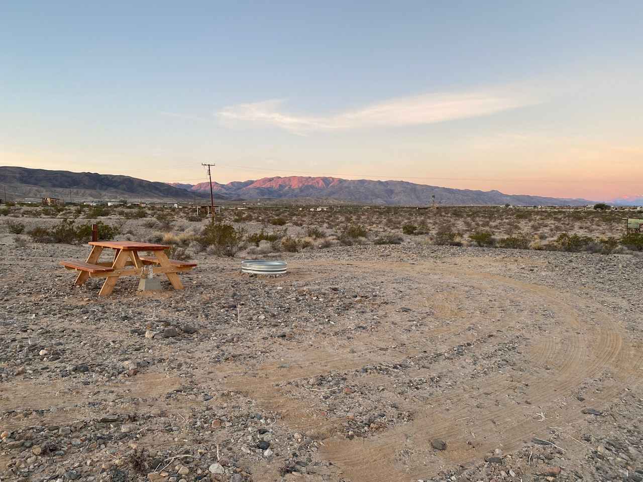 Site #2 Pull-through and around. For smaller rigs. (Joshua Tree National Park mountains in the background of photo.)