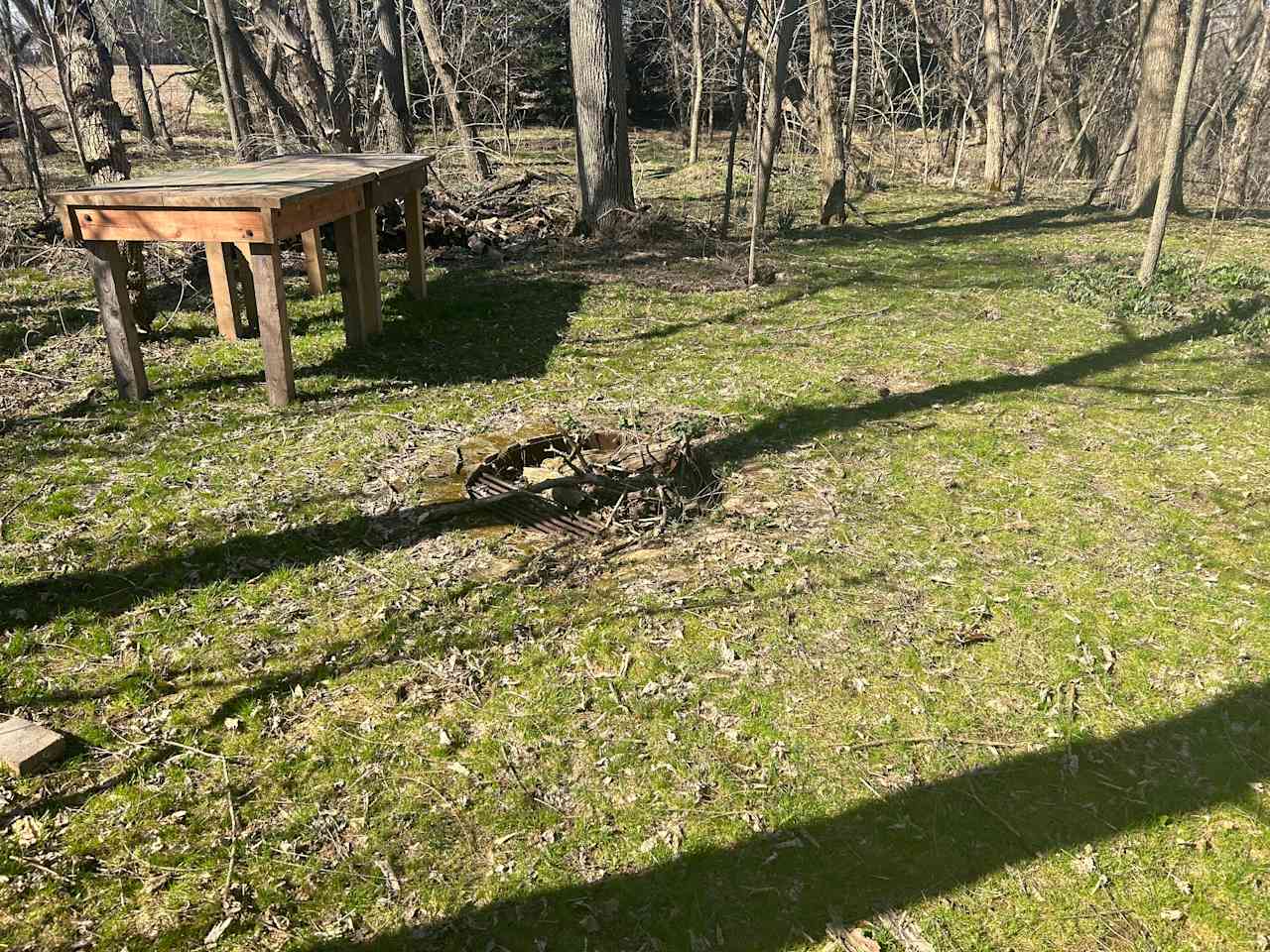 Two tall tables by firepit