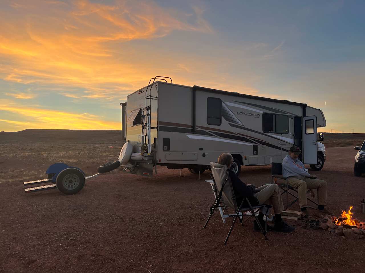 Boondocking next to Mexican Hat Rocks. Some rock firepits. Areas to explore around the property