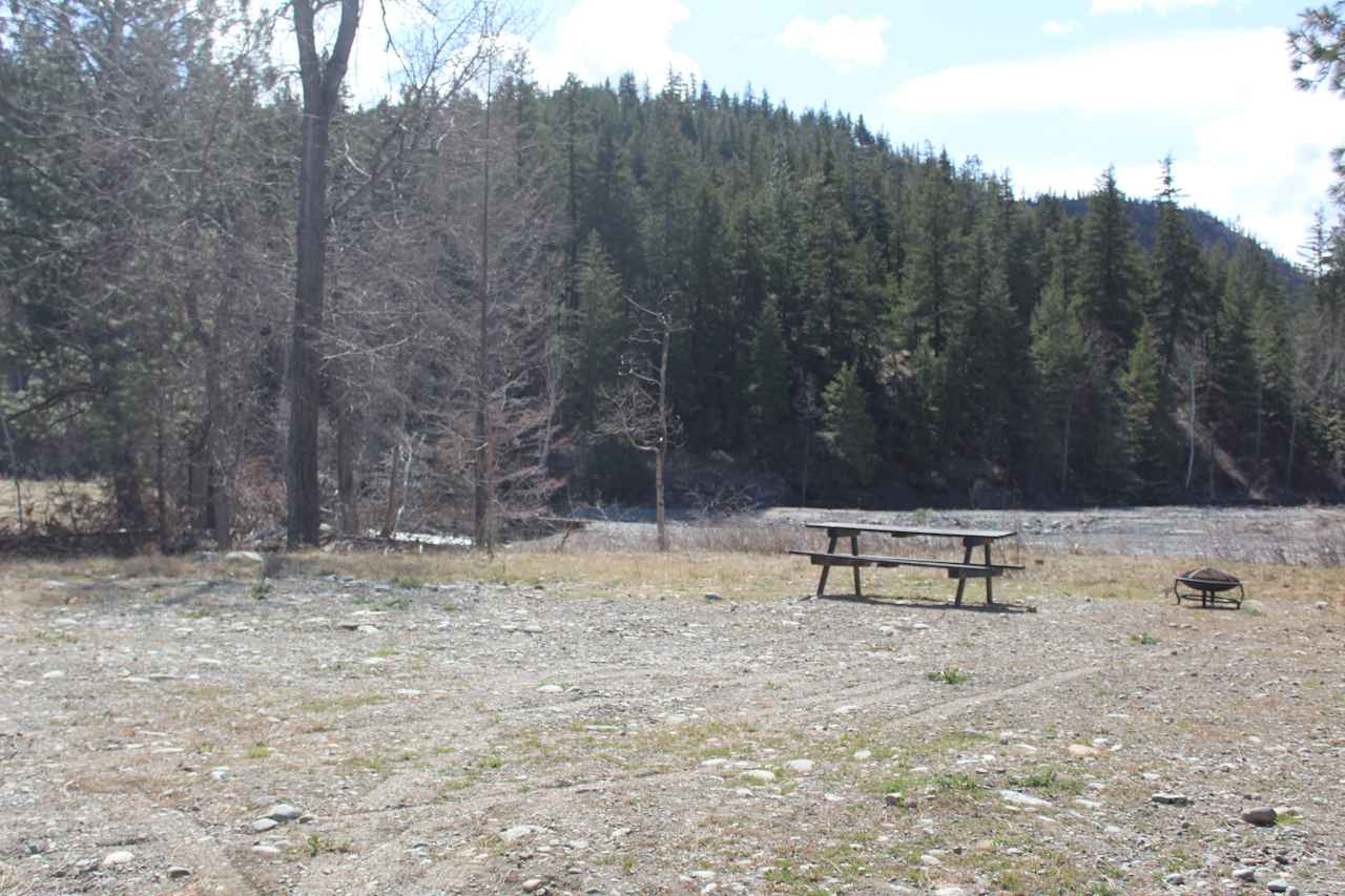 Camping area with creek just past picnic table