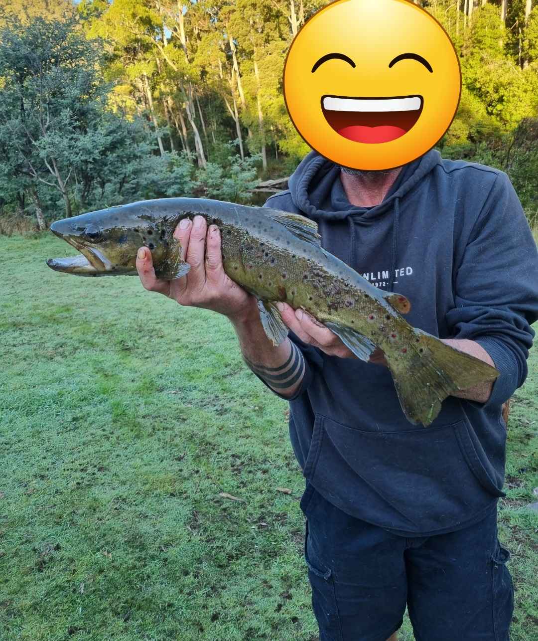 This was my fish which after I caught and was on my way to showoff to hubby I fell and hurt my hand and knee so he held it for photo before releasing.  