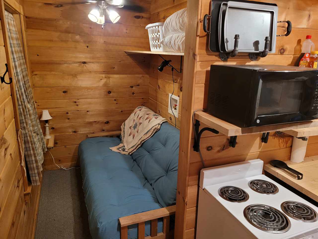 Nook bedroom (no door) with full futon