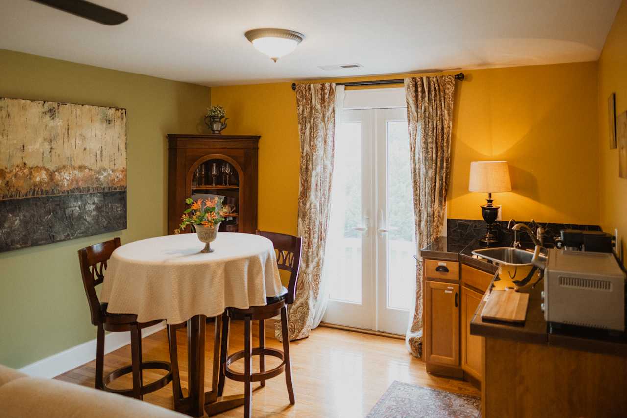 Little kitchen area with mini fridge, microwave, coffee & tea!