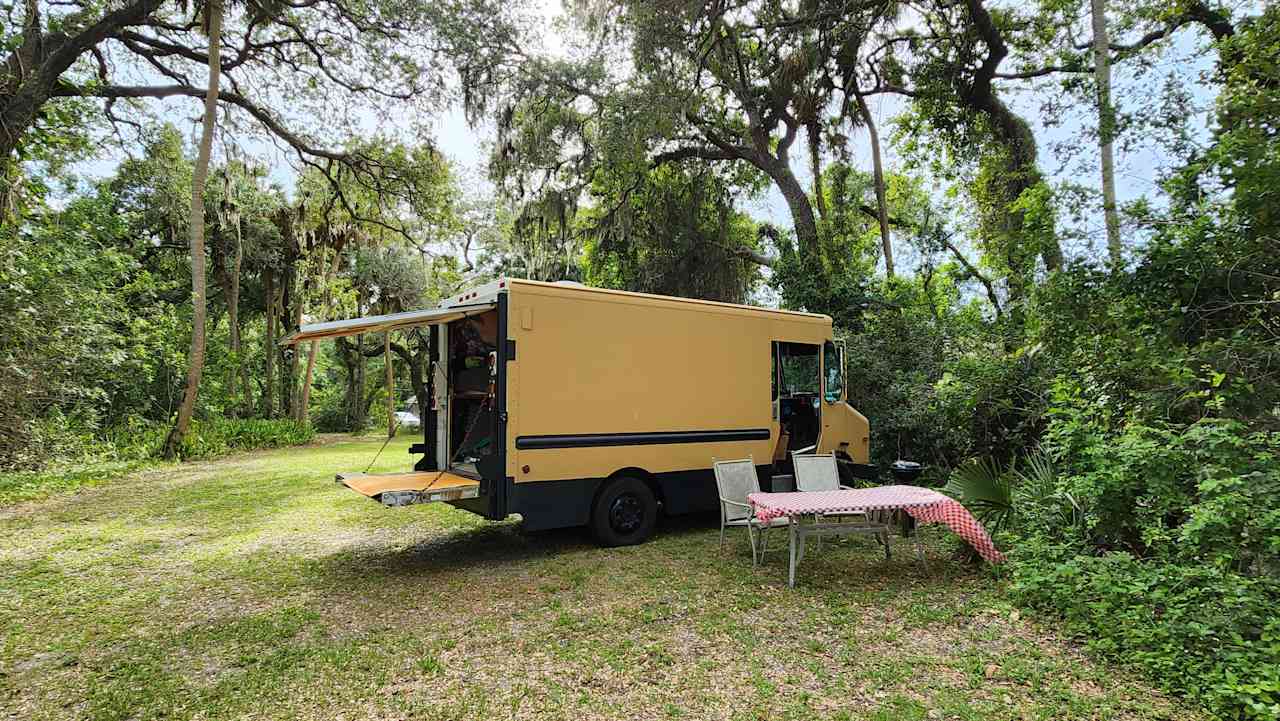 We reached out and asked if we could park our van instead of pitch a tent, he said yes and even had a table and fire pit set up for us! 